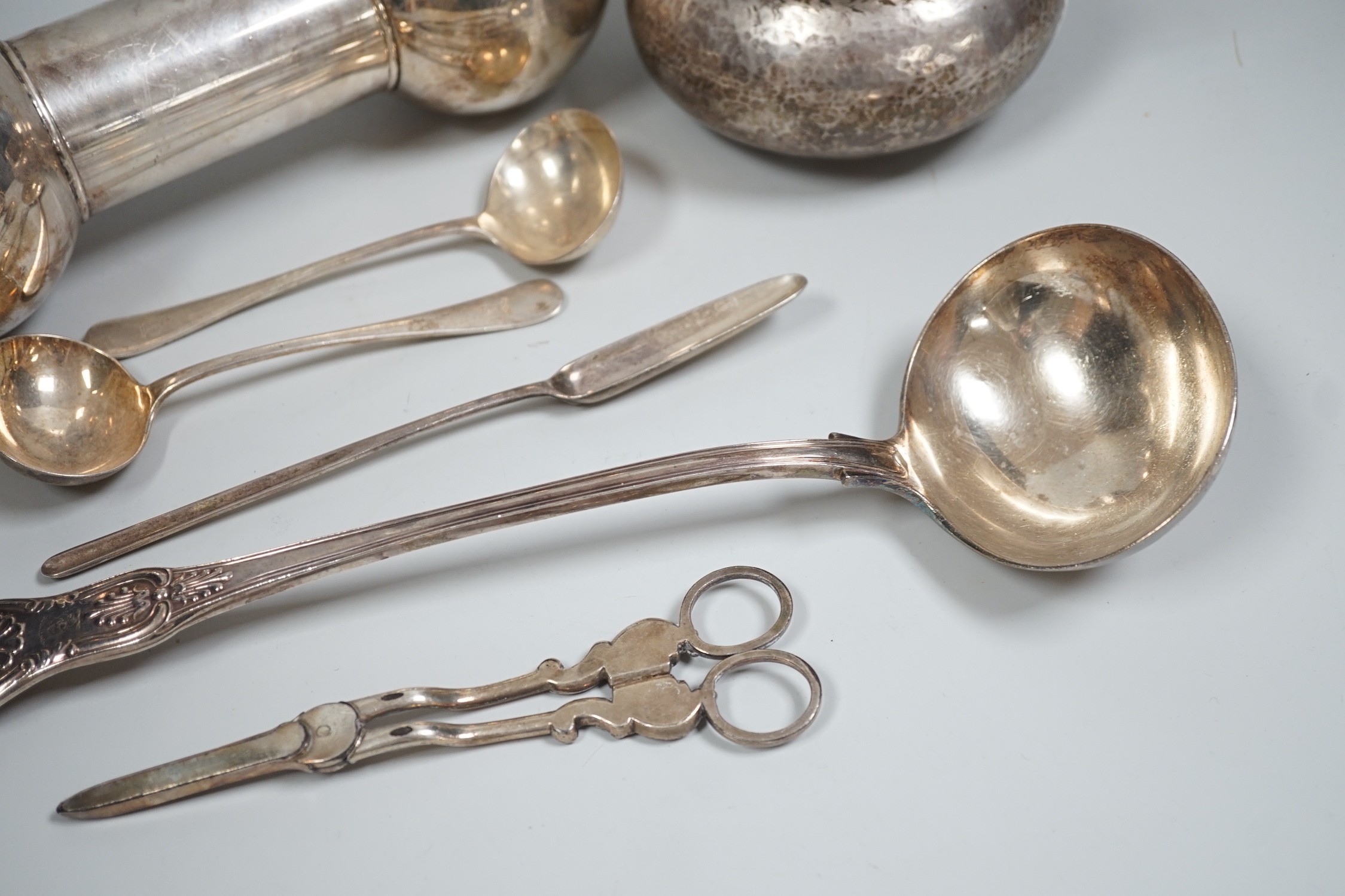 Mixed silver and plated ware including a Victorian silver Kings pattern soup ladle, London, 1857, a George III silver marrow scoop, London, 1789, a pair of later Old English pattern sauce ladles, a sterling bonbon dish,